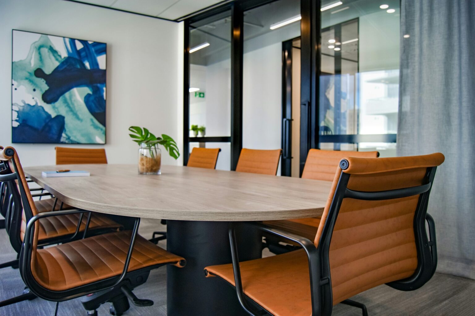 Beautiful conference room with orange chairs. The best commercial cleaning services in Portsmouth
